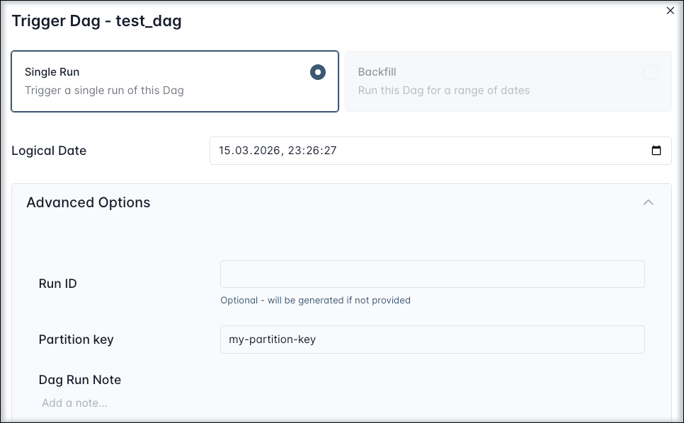 Screenshot of the Airflow UI showing the Trigger Dag run config with the partition key input field.