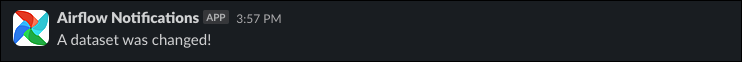 Screenshot of a Slack message sent by the webhook, saying "A dataset was changed!".