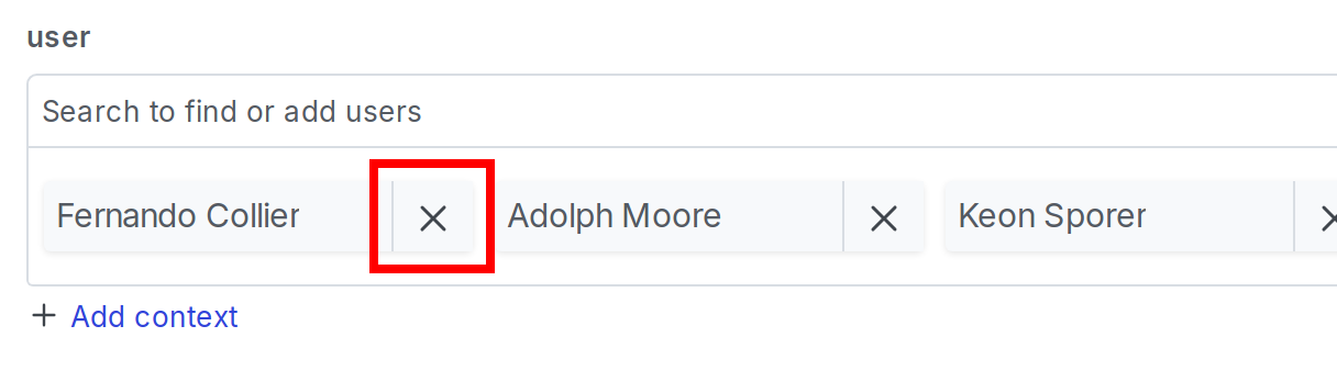 A user context in the flag's targeting section, with the "X" to remove called out.