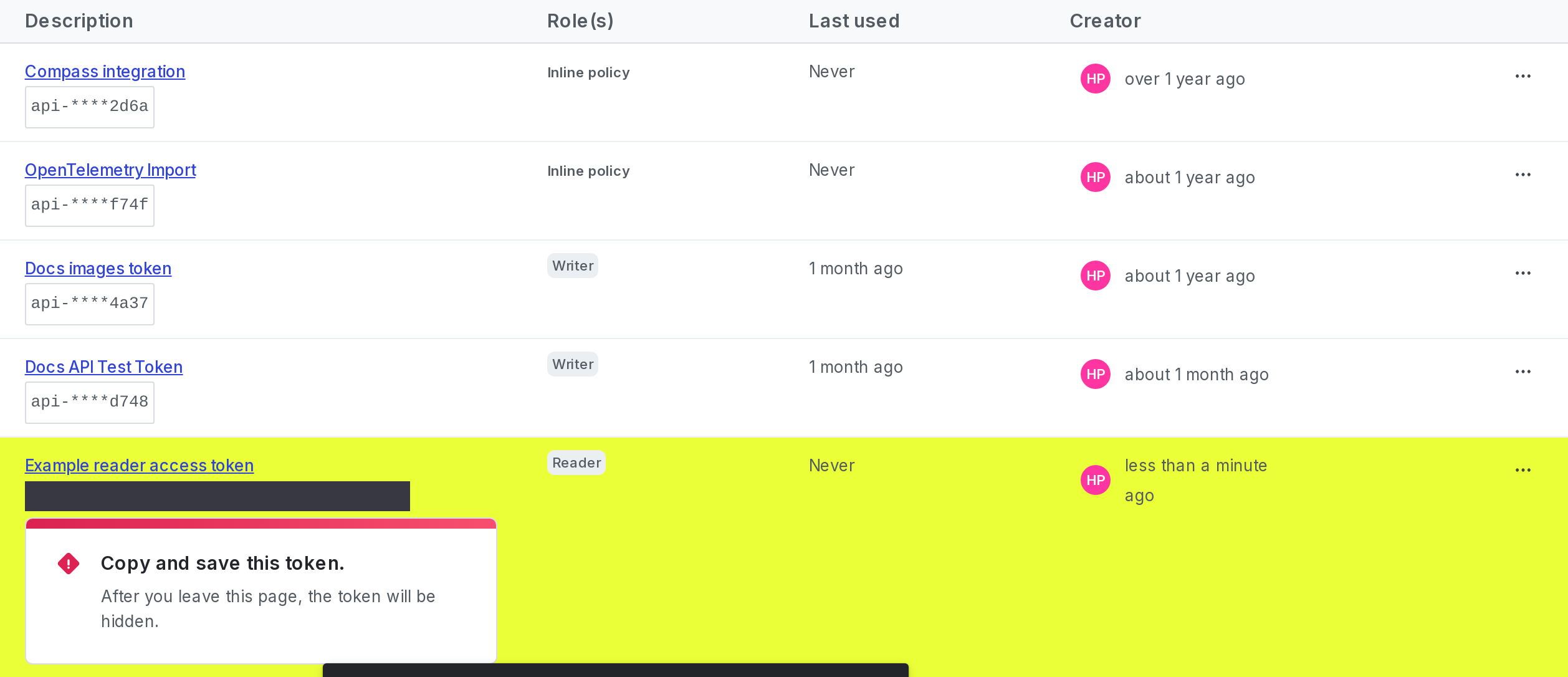 A new access token with a reminder to copy and store it displayed.
