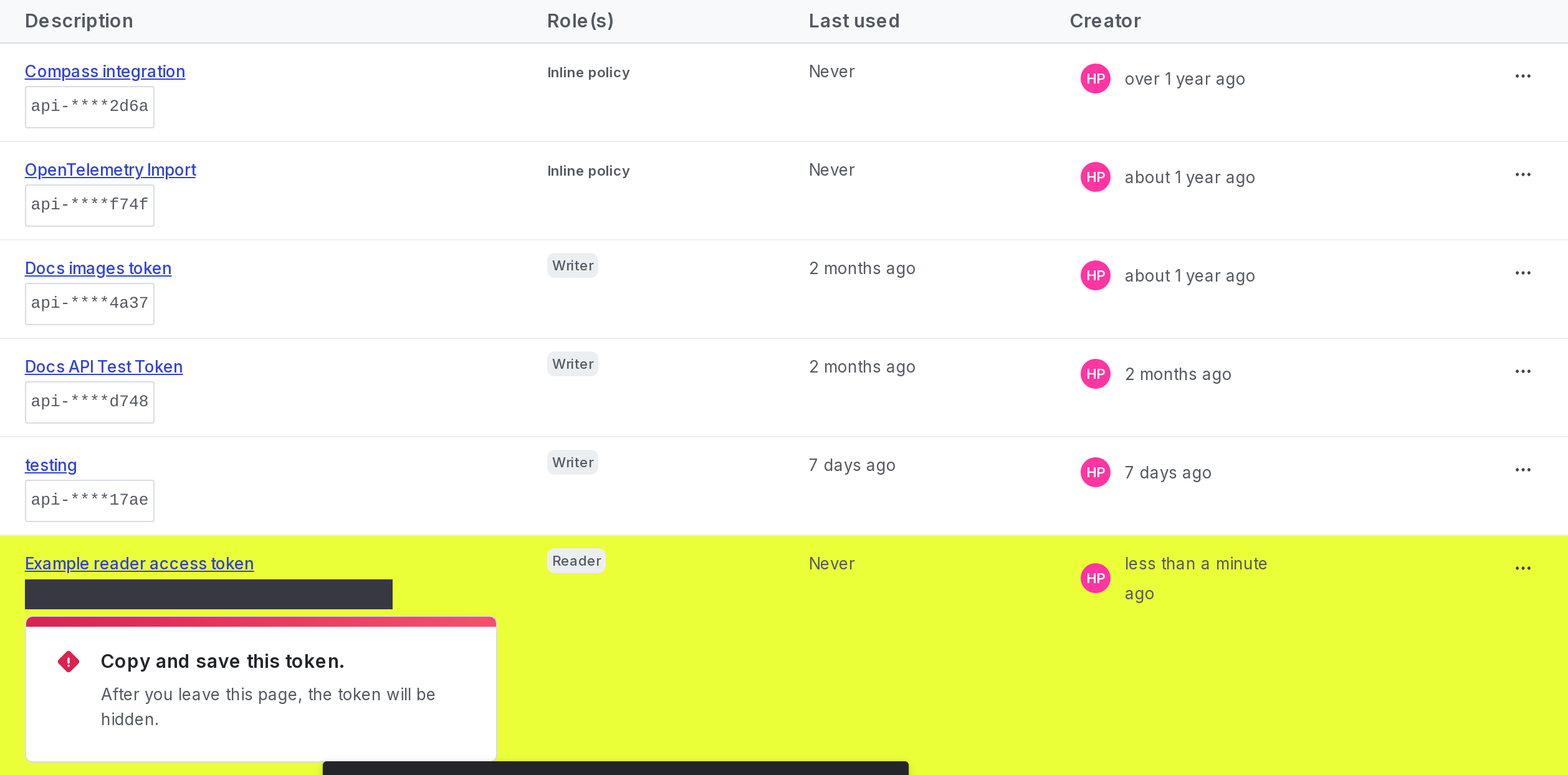 A new access token with a reminder to copy and store it displayed.