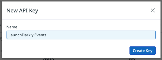 The Datadog "New API Key" modal configured with a sample name.