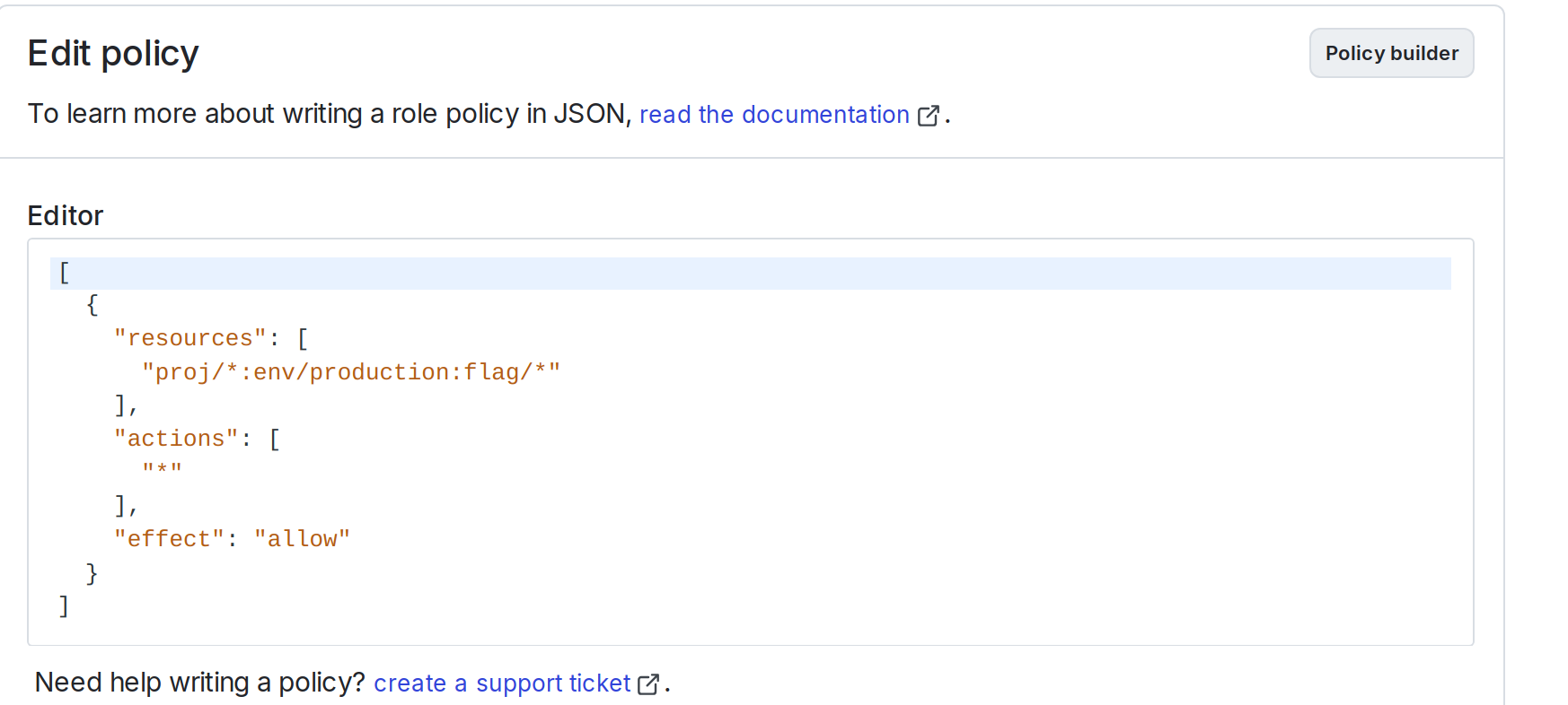 The "Edit Datadog configuration" panel with the Advanced editor open and a policy inside it.