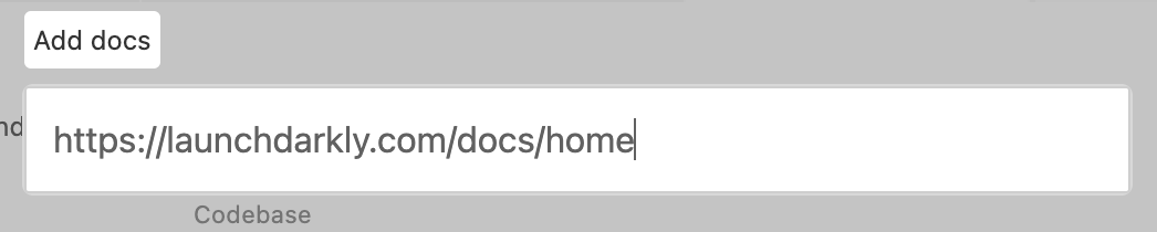 Screenshot showing the modal form for adding a specific documentation URL to Cursor.