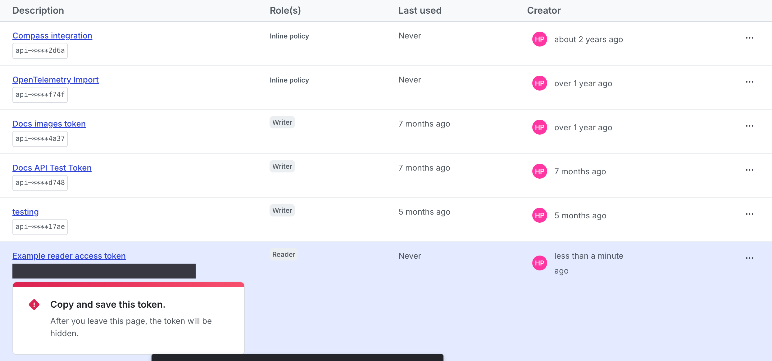 A new access token with a reminder to copy and store it displayed.