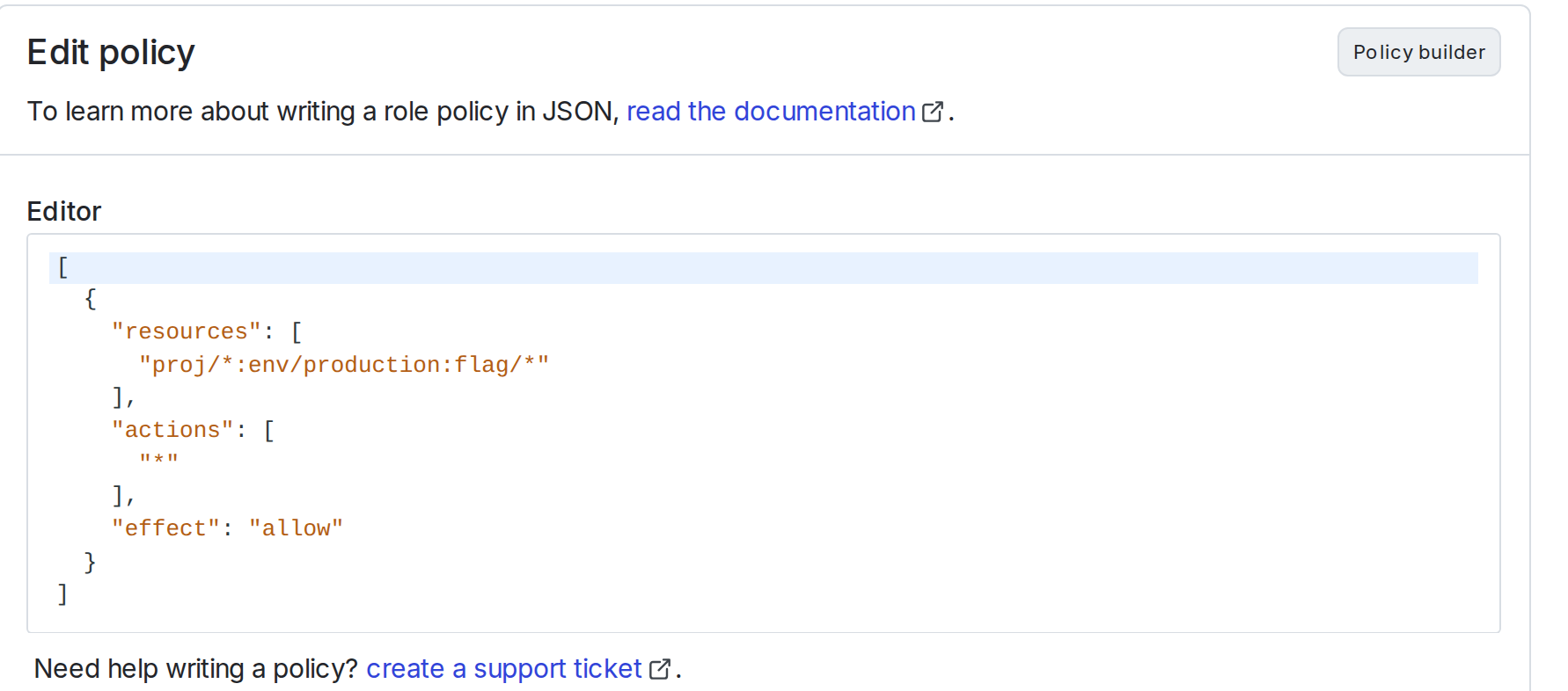 The "Edit Datadog configuration" panel with the Advanced editor open and a policy inside it.