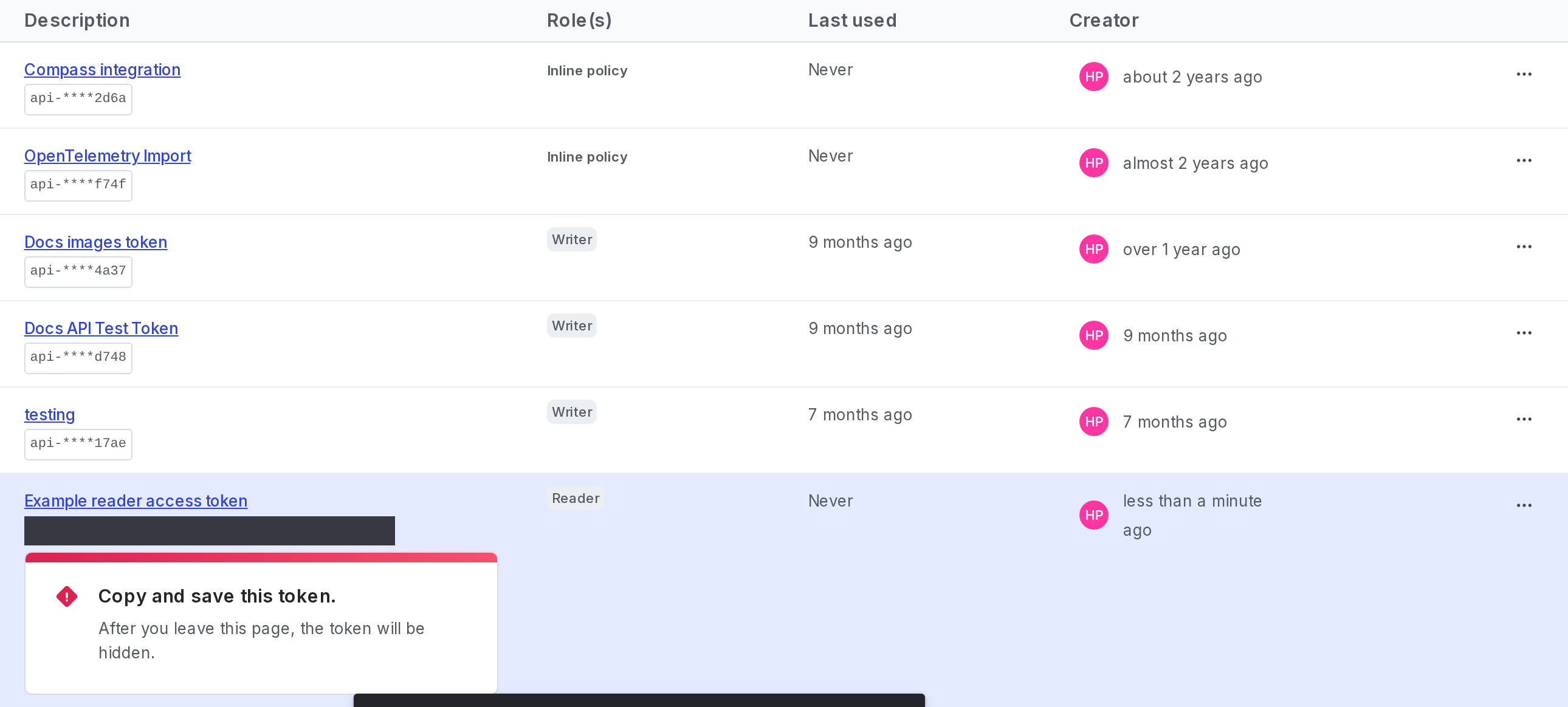 A new access token with a reminder to copy and store it displayed.