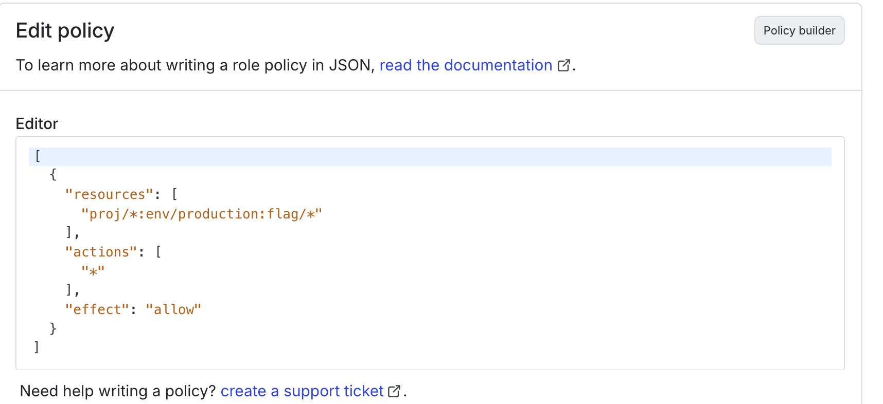 The "Edit Datadog configuration" panel with the Advanced editor open and a policy inside it.