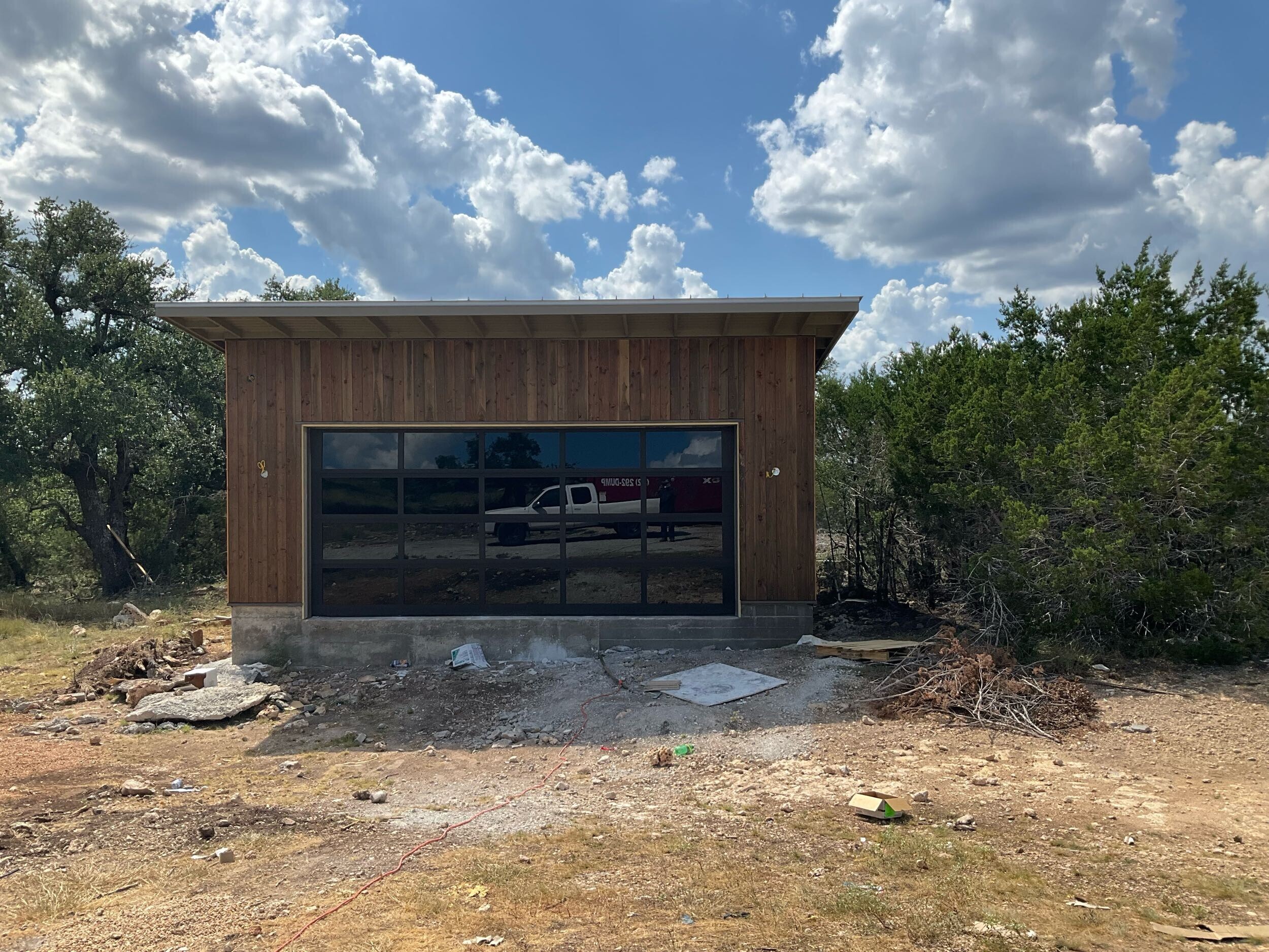 Completed garage structure with finished exterior and roof