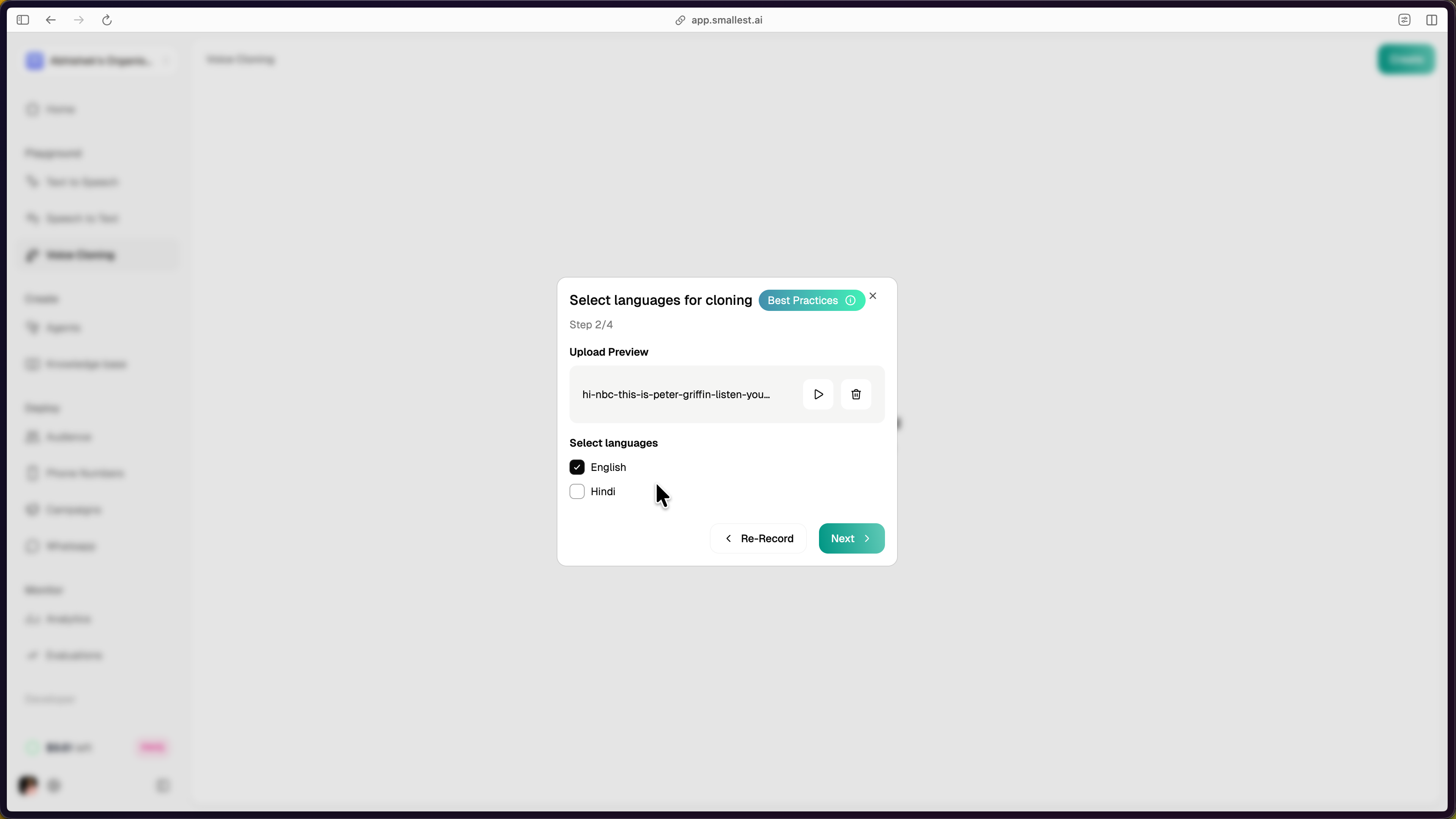 Language selection dialog showing English selected and Hindi available with audio preview